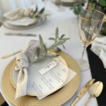 Sage and gold table setting for a wedding