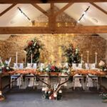 Rustic barn wedding top table set up
